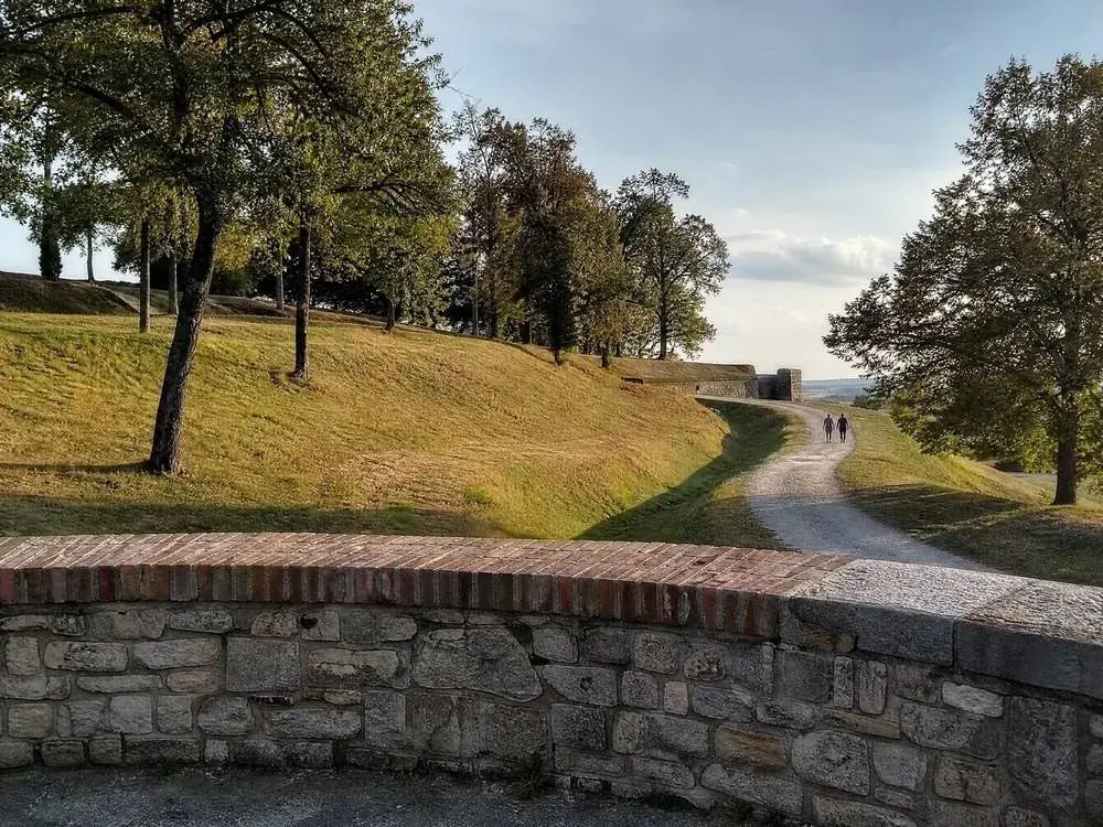 Grass, old walls and trees on the fortress hilltop